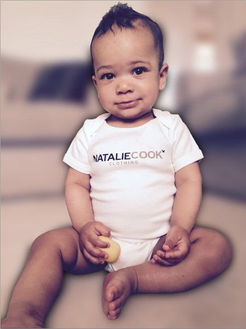 http://www.nataliecookclothing.com/products/limited-edition-natalie-cook-baby-grow